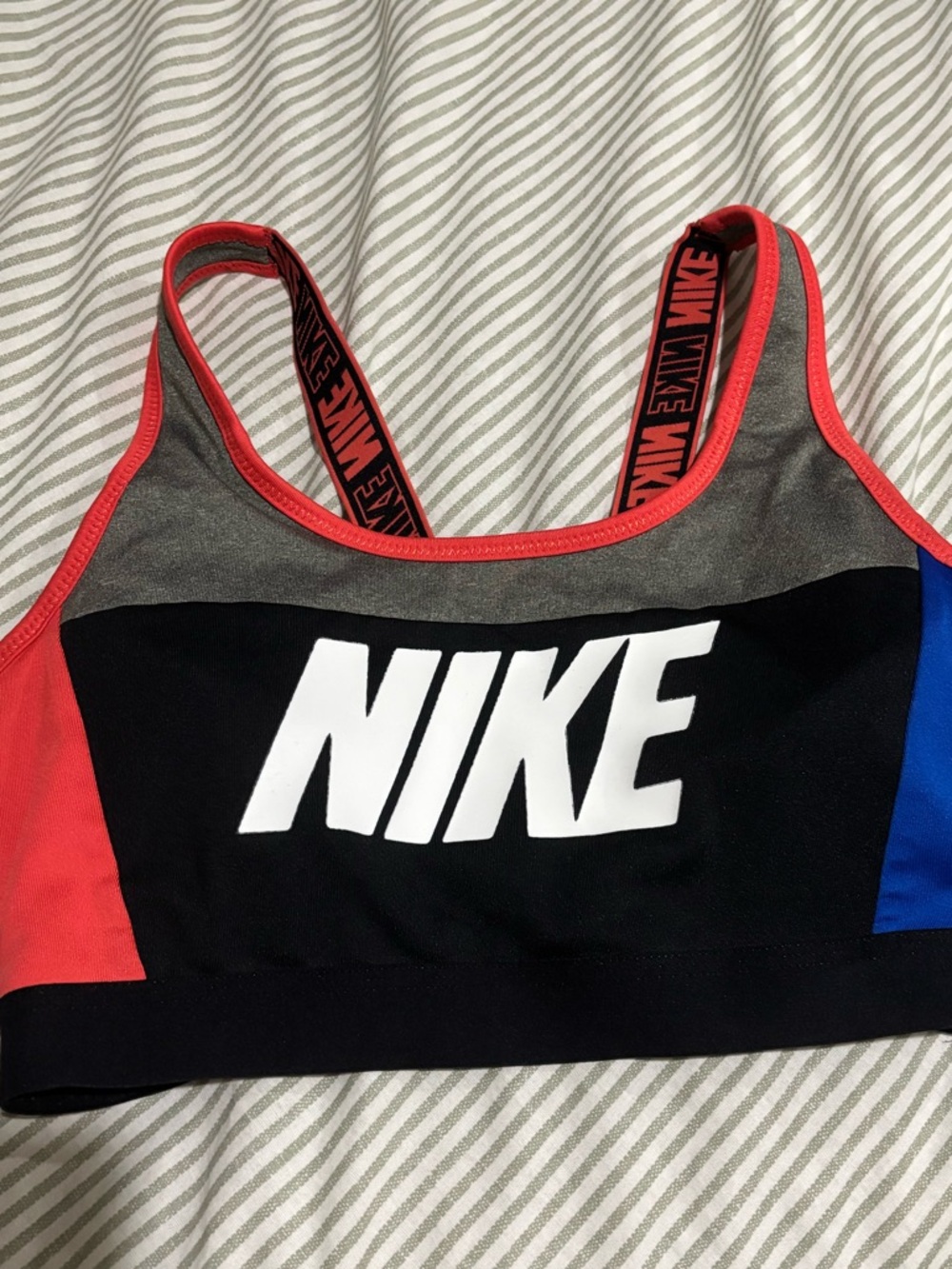 Nike Colorblock Sports Bra in Black with Red & Blue Accents
